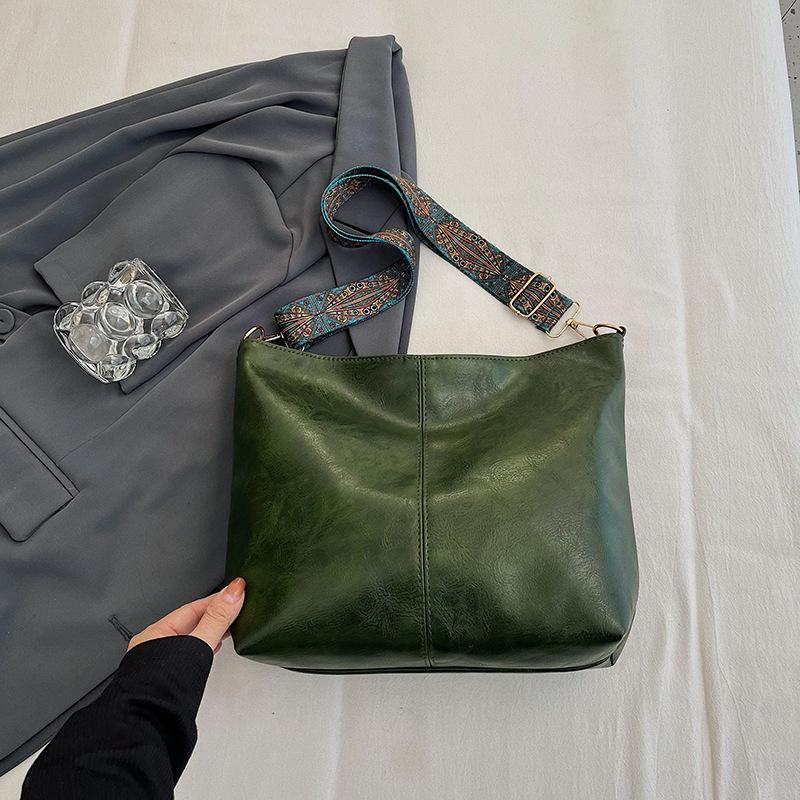 2025 Retro Shoulder Bags: Women's Large Capacity Wide-Band Messenger Bags - Spring/Summer Advanced Texture Bucket Design.