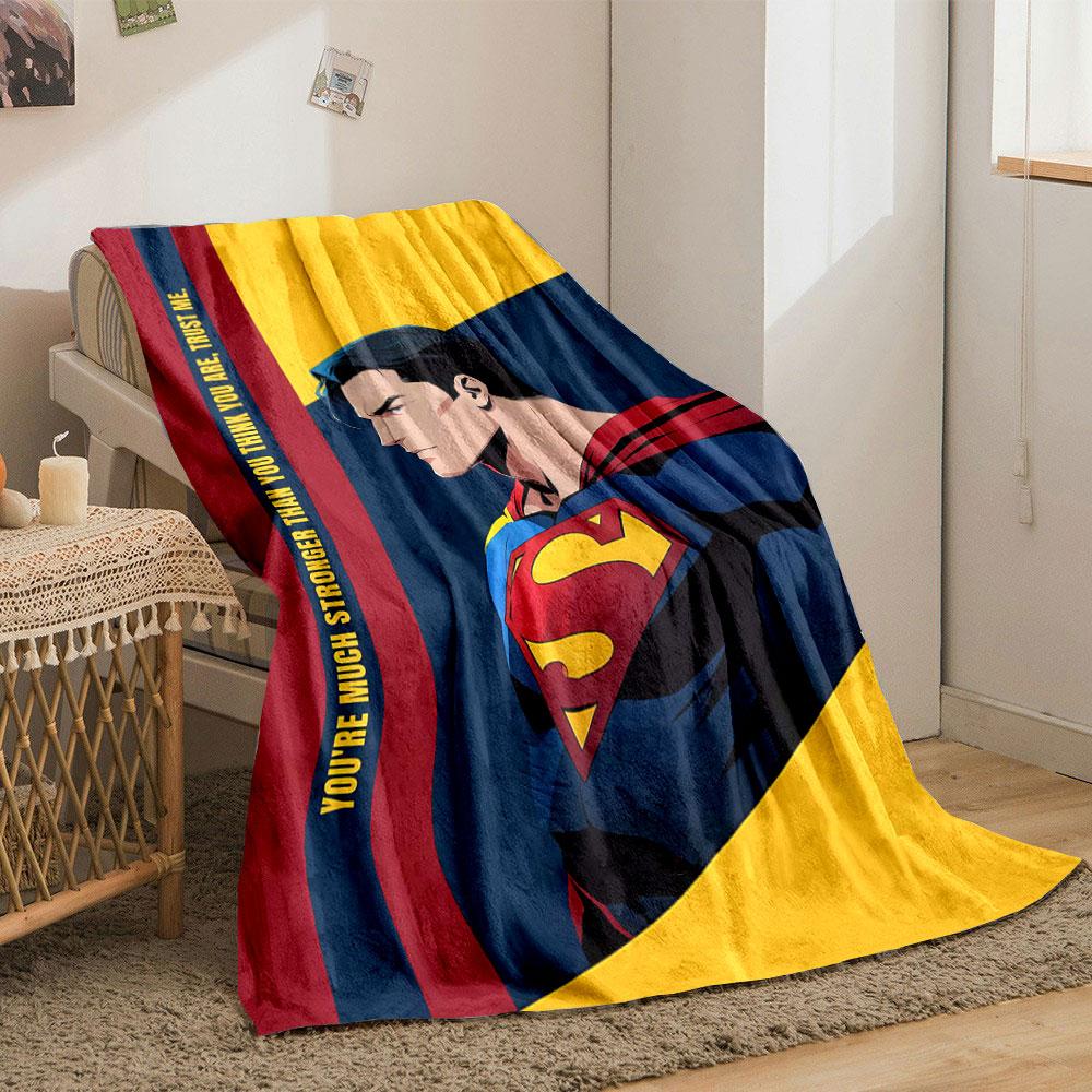 Comic-style superhero with red, blue, and yellow design elements. for all seasons blanket lunch break throw gift