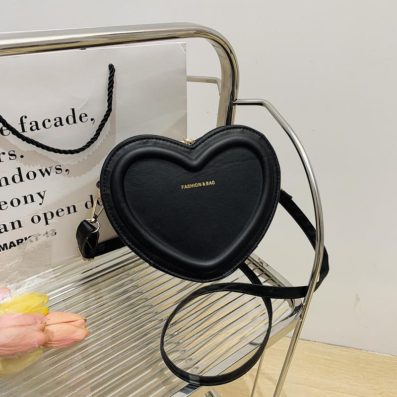 Лидер продаж, сумки через плечо в форме сердца для женщин, однотонные сумки на ремне из искусственной кожи, модные сумки