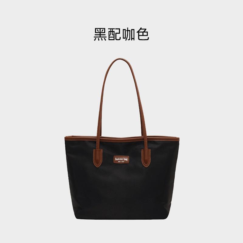 Осенне-зимние сумки женские сумки-тоут большой вместимости, новые модные большие сумки для通勤, портативные сумки через плечо, оксфордские сумки-тоут.