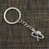 Fashion Keychain 25x16mm Hockey Player Sporter Bronze Silver Color Pendants DIY Men Jewelry Car Key Chain Ring Holder Gift