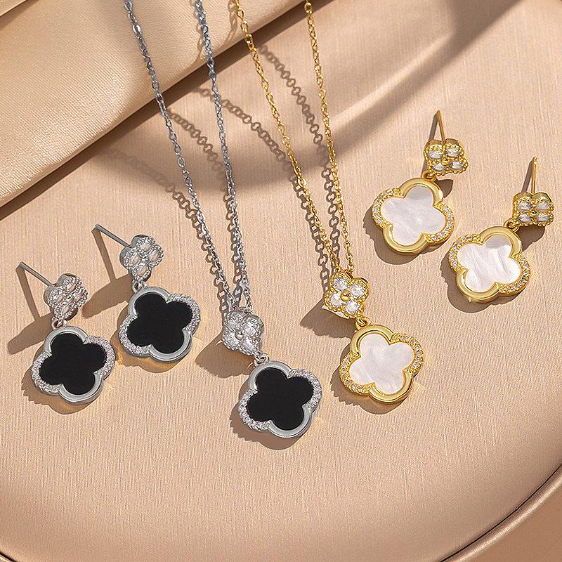Набор из титановой стали с четырехлистником: ожерелье и серьги. Высококлассная сдержанная роскошь. Уникальные и элегантные серьги. Украшения на ключицу.