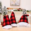 Cozy Red And Black Plaid Christmas Hat With Soft White Fur Pom Poms For Festive Cheer