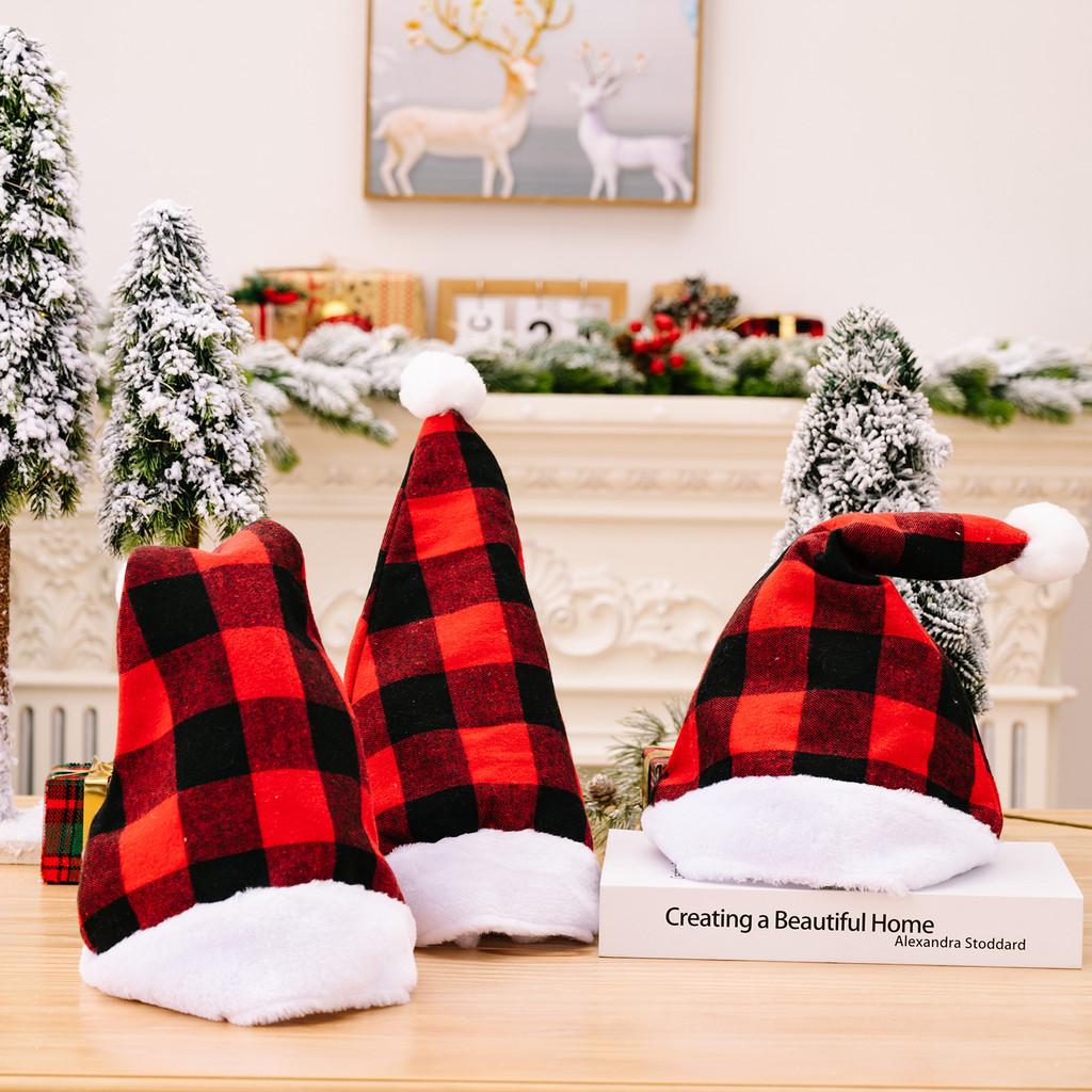 Cozy Red And Black Plaid Christmas Hat With Soft White Fur Pom Poms For Festive Cheer