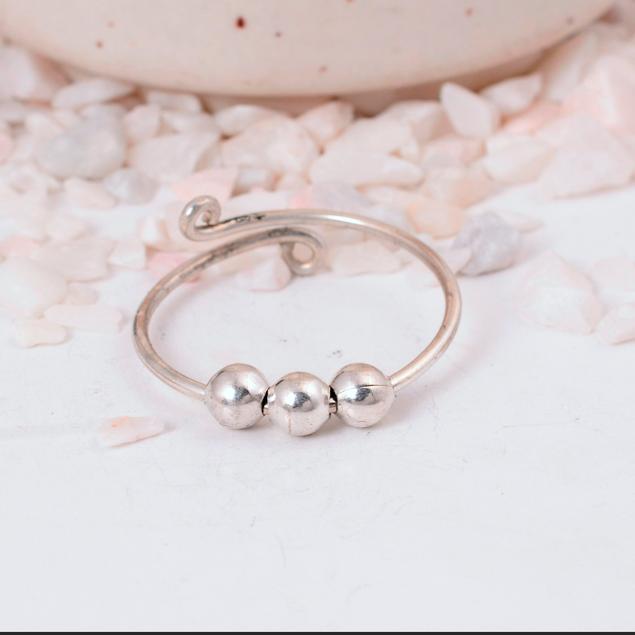 Adjustable Silver Fidget Ring: Anxiety Relief Spinner Jewelry with Three Small, Movable Beads and an Open Wire Wrap Design.