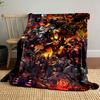 The image showcases fiery-themed, armored characters in a chaotic battle. for all seasons blanket lunch break throw gift