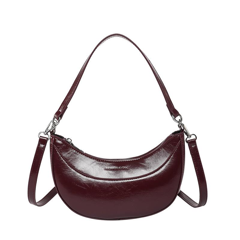 New product niche simple personality hand carry crescent moon bag versatile temperament commuter oil wax leather messenger bag female