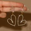 Exaggerated hollow out heart-shaped rhinestone earrings suitable for girls to wear daily, give gifts on holidays and birthdays