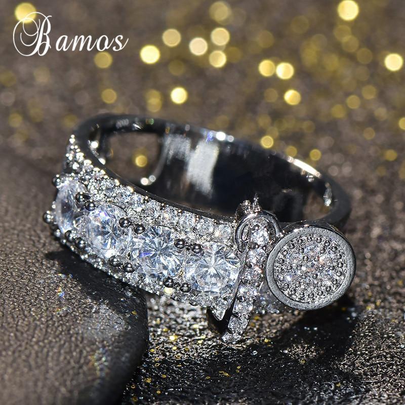 Массивное женское кольцо усыпанное кристаллами с подвеской