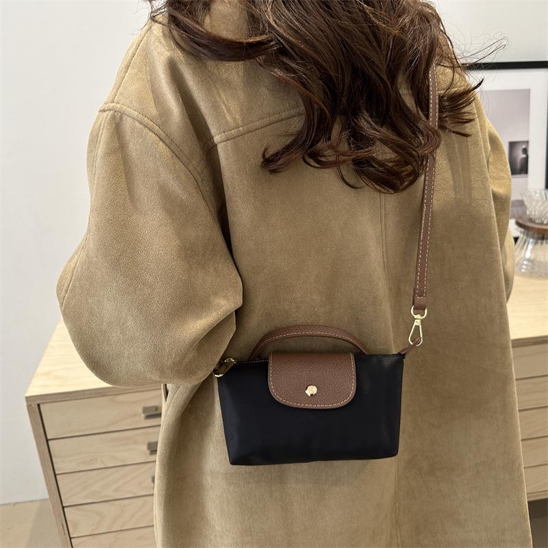 Retro dumpling bag 2026 new shoulder messenger bag fashion handbag simple personality contrasting color casual bag