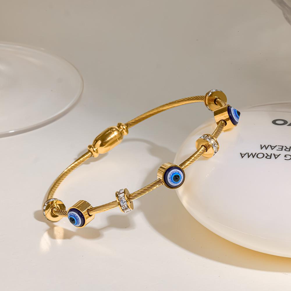 European and American literary retro stainless steel zirconium blue eye devil's eye bracelet plated with 18k gold adjustable bracelet