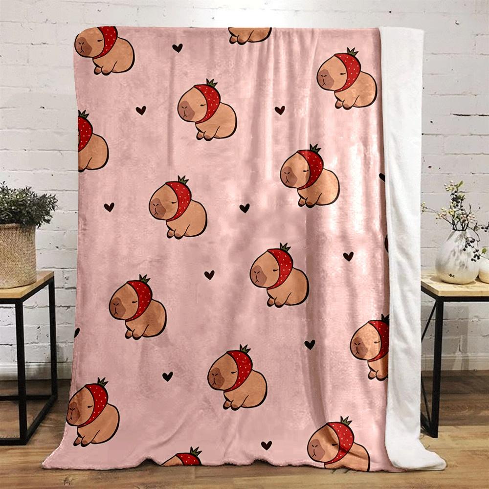 Cartoon capybaras wearing strawberry hats, scattered hearts on pink. for all seasons blanket lunch break throw gift
