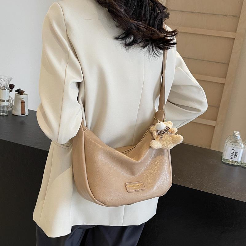 Популярная мода этого годаЖенская сумка-мессенджер из мягкой кожи 2025 весна новая универсальная сумка-пельмень