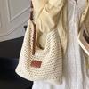 Woven hollow bag women's 2025 new summer seaside vacation travel tote bag beach bag armpit bag