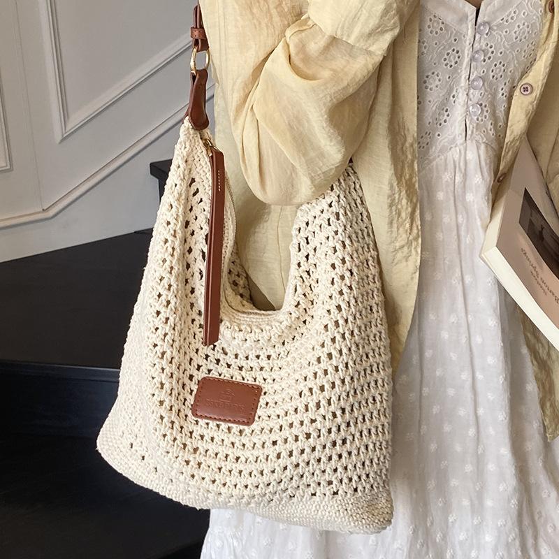 Woven hollow bag women's 2025 new summer seaside vacation travel tote bag beach bag armpit bag