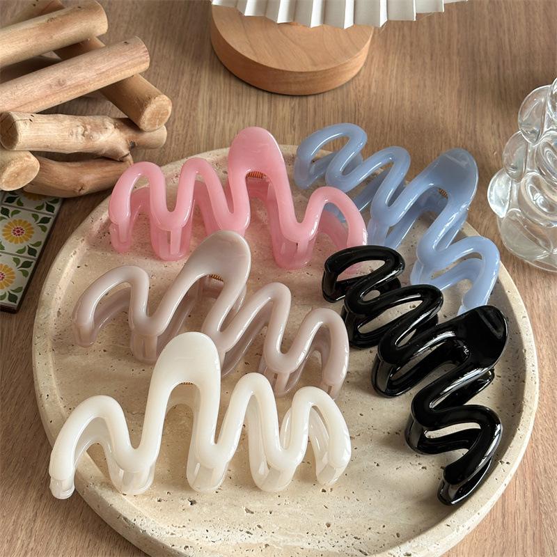 Fluid Wave Silhouette Hair Clip In Dreamy Translucent Hues Provides Secure Hold For Messy Buns And Modern Minimalist Updos