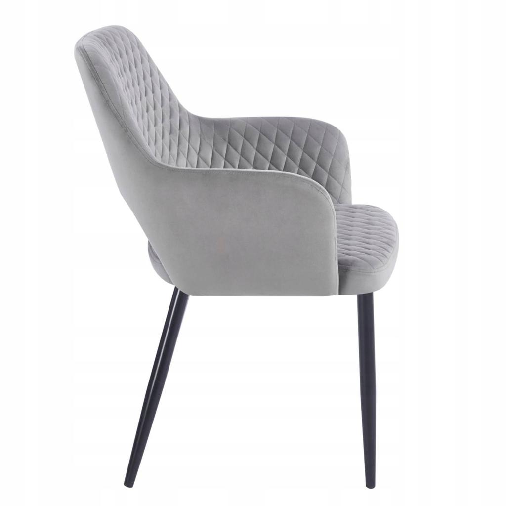 Gray velvet chair with Scandinavian quilting and black legs for the living room