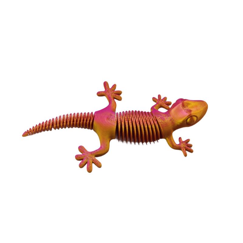 3D-печатная шарнирная игрушка-ящерица на пружине