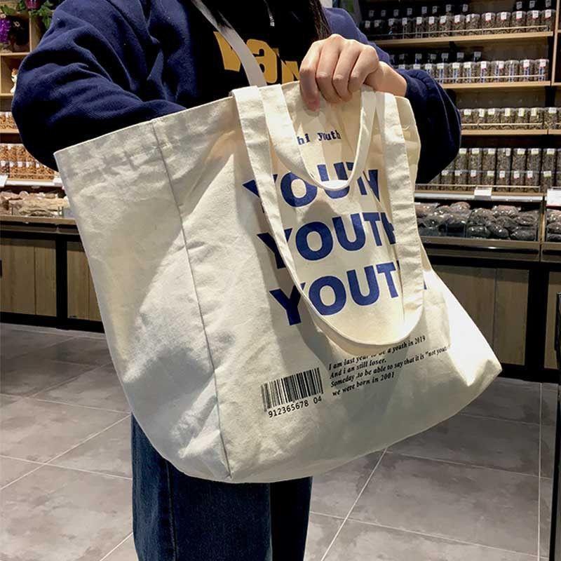 Artful Literary Letter Print Canvas Tote Bag Stylish Shoulder Bag for Booklovers Durable Spacious for School