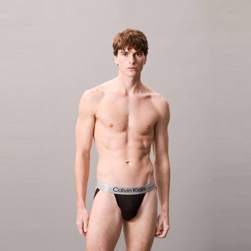 Calvin Klein Блестящее полупрозрачное нижнее белье-стринги с двойным ремешком Shiny Gravity для мужчин, нижнее белье, космически-черный цвет, NB4125-UB1