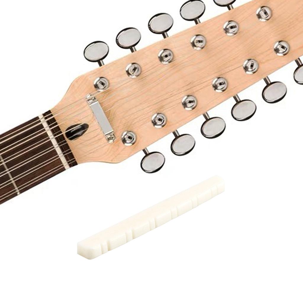 Костяной бридж-седло и порожек для 12-струнной акустической гитары. Заменители из настоящей кости крупного рогатого скота.