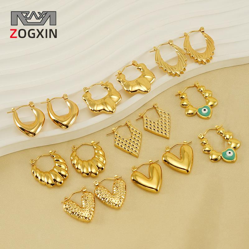 Cross-border European and American high-end stainless steel plating18K Gold vintage design hollow green eye earrings