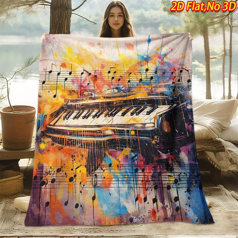 A 2D Flat Printed Spring And Summer New Arrival Fleece Blanket Featuring a Skin-Friendly Color Piano Music Theme, with High-Definition Digital Printin