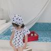 2024 Korean Girl's One-Piece Swimsuit: Black & White Heart with Bow and Lotus Leaf Sleeves.