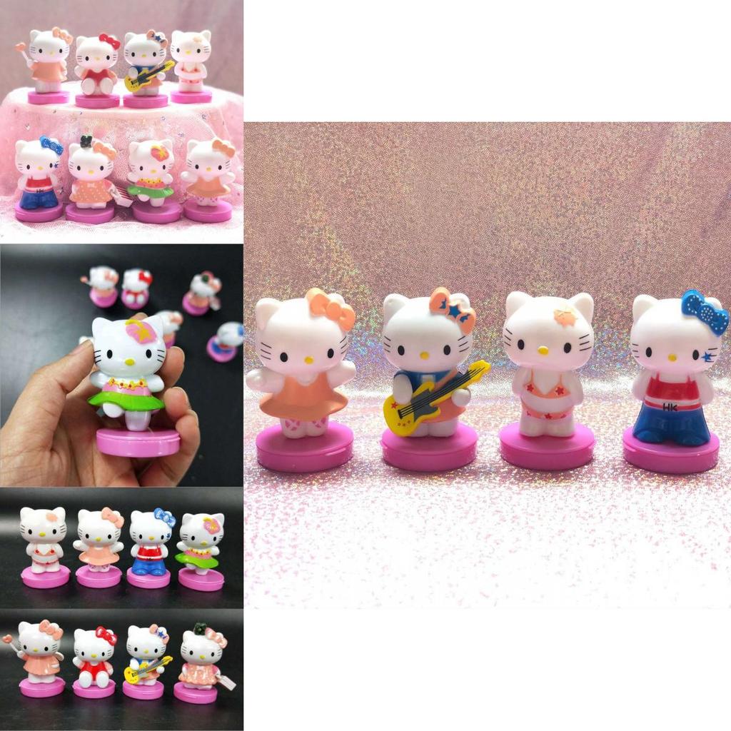 Очаровательный набор из восьми миниатюрных кукольных домиков Hello Kitty. Идеально подходит для тортов и садов