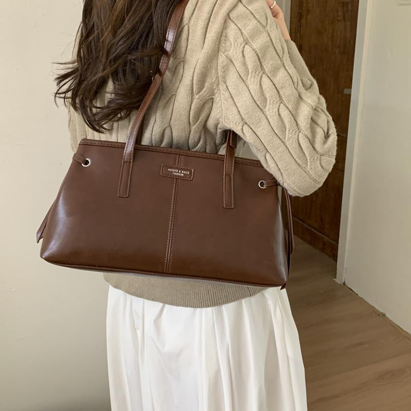 2025 осень и зима женская сумка новая мода женская сумка универсальная сумка для поездок на работу на плечо подмышку сумка-тоут