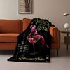 A woman in pink sits atop a cocktail glass on a black vintage poster. for all seasons blanket lunch break throw gift