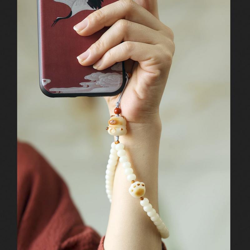 Natural Bodhi Root Phone Strap with Cute Charcoal-Crafted Cat Paw Pendant, Creative Artistic Accessory for Women