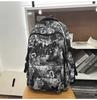 Schoolbag trendy cool graffiti new burden reduction schoolbag junior high school students large capacity backpack high value lightweight women's 