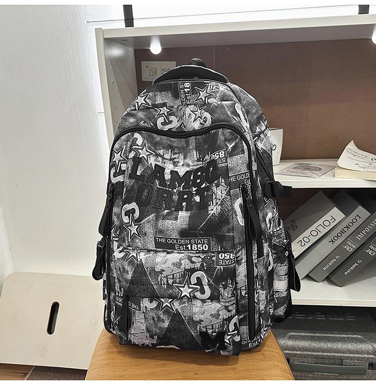Schoolbag trendy cool graffiti new burden reduction schoolbag junior high school students large capacity backpack high value lightweight women's