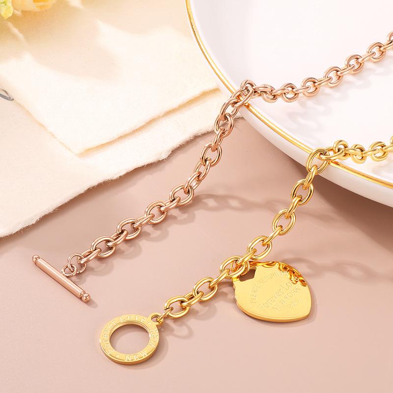 Heart-Shaped Titanium Steel Bracelet with OT Buckle and English Letter Charm