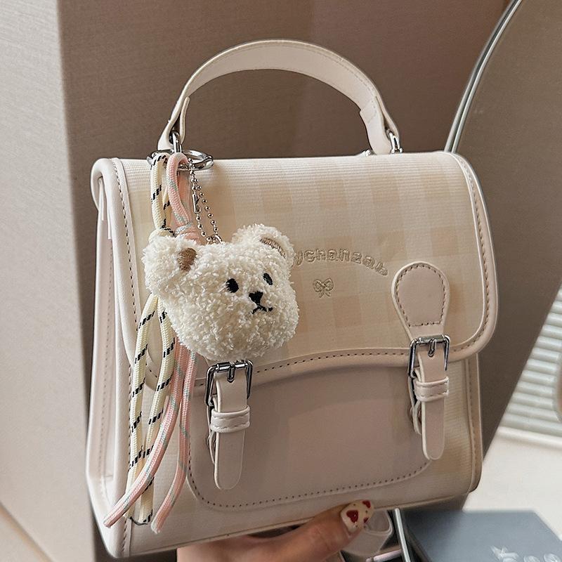 Casual plaid women's backpack 2025 summer new small backpack high value contrasting color portable small schoolbag