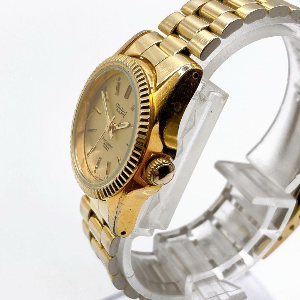 Б/у 406 ORIENT SWIMMER100 Женские часы Кварцевые Золотые