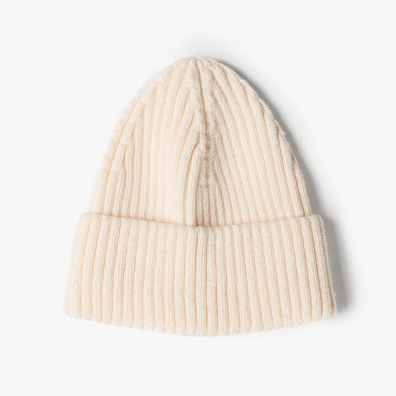 Fashion jacquard knitted hat women's autumn and winter outdoor warmth brimless pointed hat thickened ear protector wool hat tapered hat