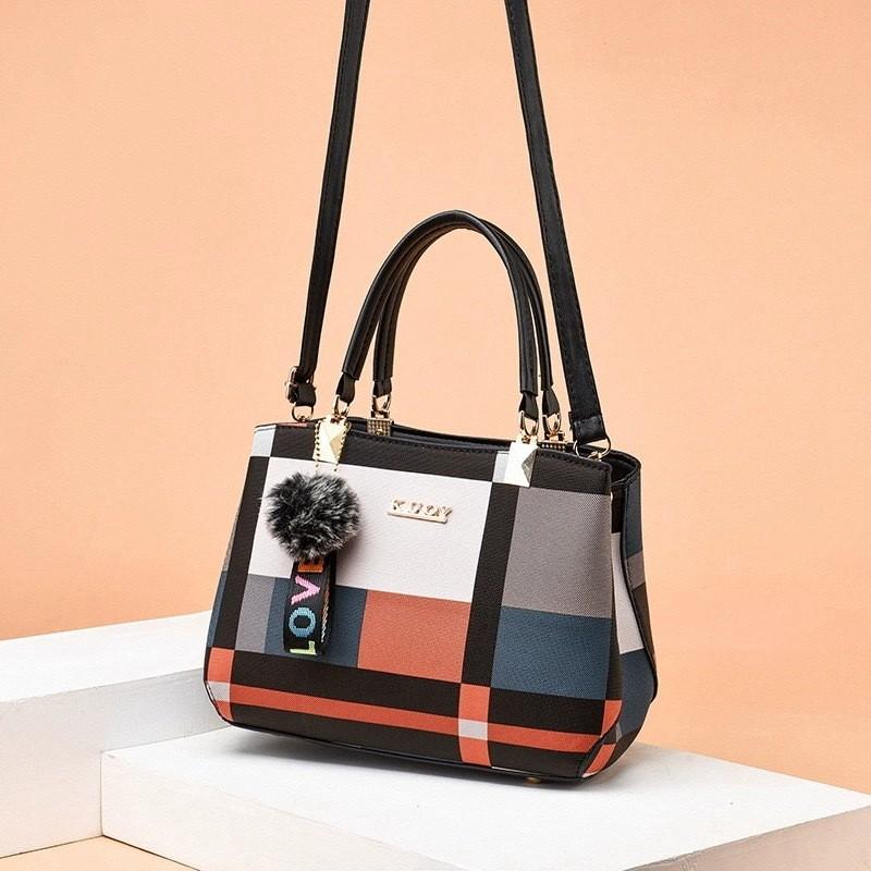 Fashionable Female Handbag With Large Capacity And Inner Zipper Pockets For Daily Carry