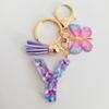 Fashion butterfly fringe initial keychain Drop glue Blend sequin A-Z26 letter keychain Cute Ladies Student Bag Accessory Gift