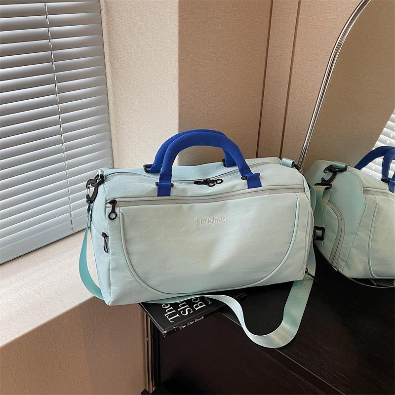 2026Solid color portable short-trip travel bag, lightweight sports storage shoulder bag, gym bag, lightweight business trip luggage bag
