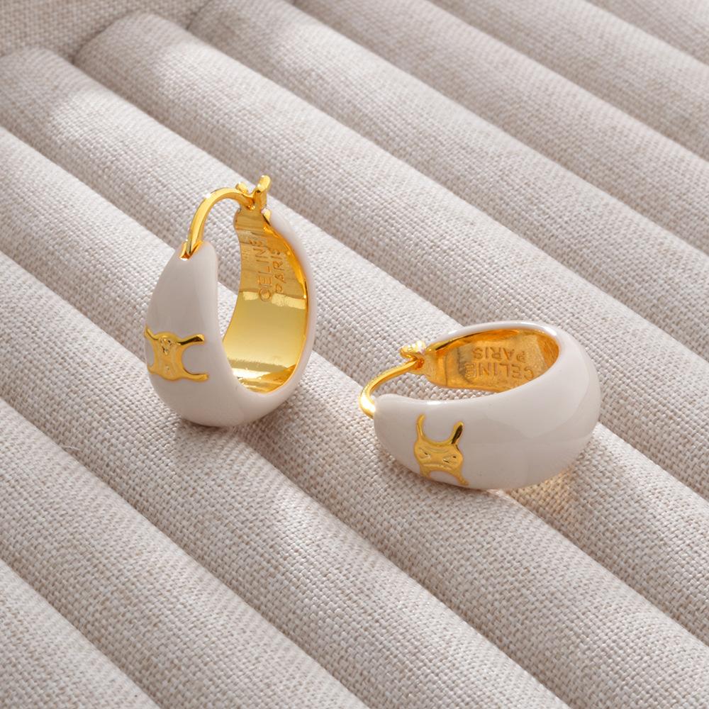 Французская Триумфальная арка, черные масляные серьги-капли, застежка для ушей, покрытая медью 22-каратного золота, легкая роскошь, премиальный темперамент, универсальные украшения для ушей