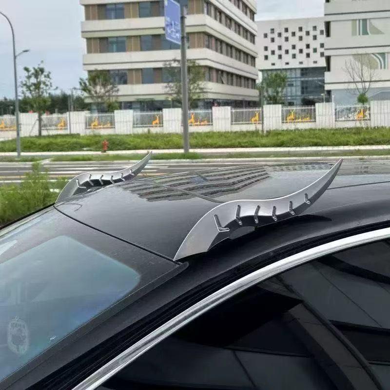 Изогнутый спойлер в виде рога дракона: Уникальные плавники для украшения крыши автомобиля