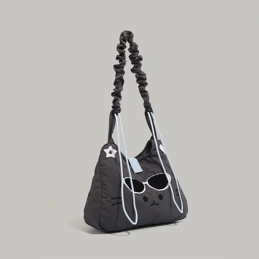 This year's popular new cute cat tote bag is a large-capacity commuter shoulder and crossbody bag with a fashionable pleated design