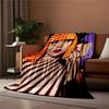 Striped shadow patterns across faces and vibrant hair colors. for all seasons blanket lunch break throw gift