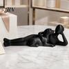 Modern Abstract Art Decor 3D Printed Man Lying on Dog Statue, Minimalist Human Pet Desktop Ornaments for Owners Figurine, Matte Black Sculpture