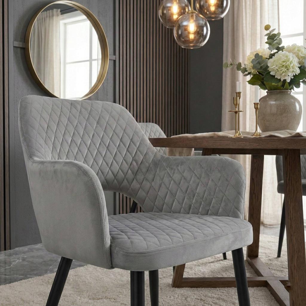 Gray velvet chair with Scandinavian quilting and black legs for the living room
