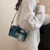Women's bag 2025 new European and American fashion rivet shoulder bag ins niche design versatile messenger box bag
