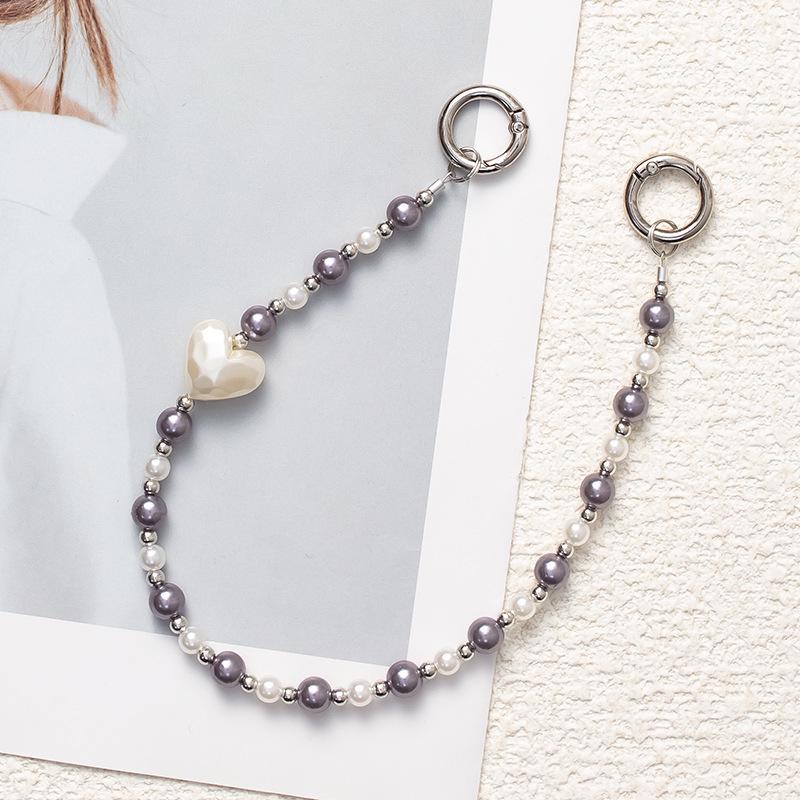 Жемчужный бант на запястье: Стиль Douyin, Защита от потери, Универсальная высококлассная цепочка из бусин для мобильных телефонов