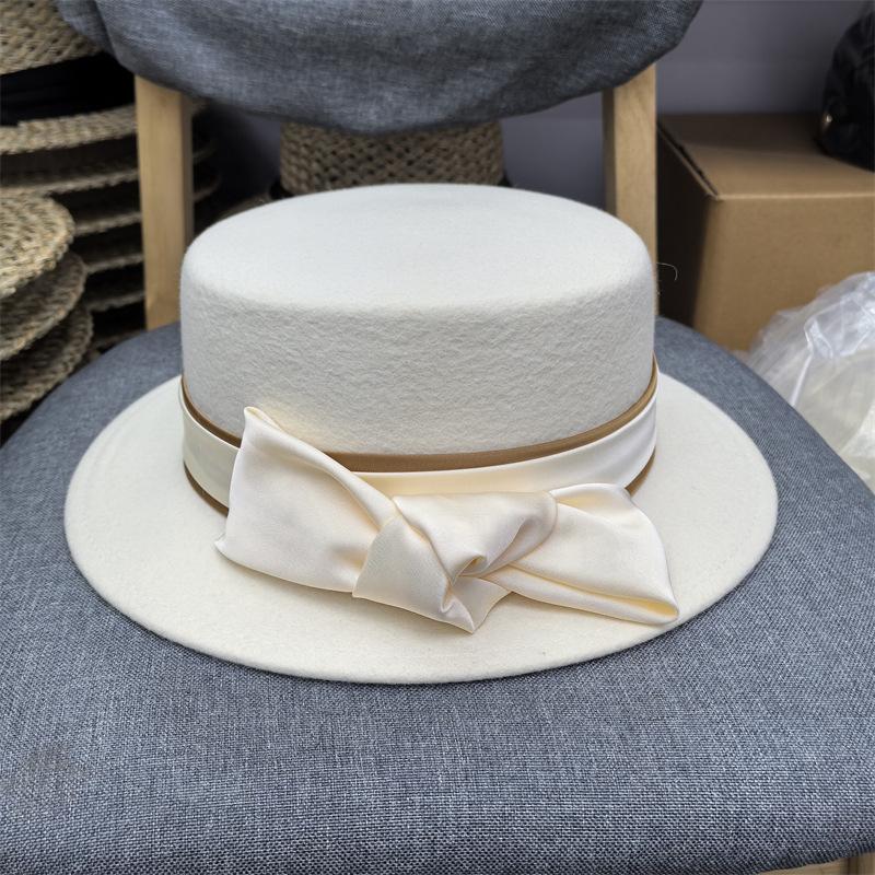 New woolen bow Hepburn style top hat female elegant flat top bucket hat French retro basin hat big eaves hat
